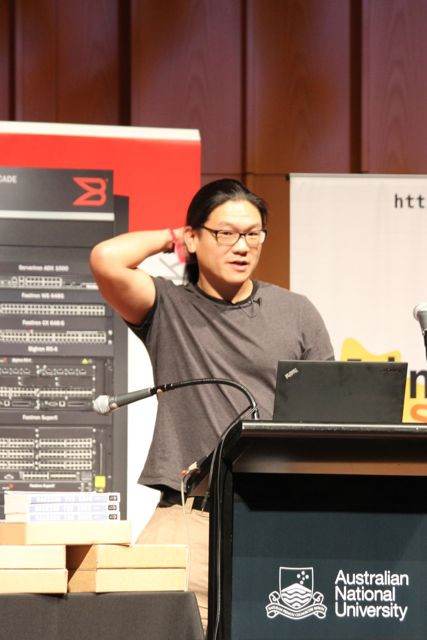 Andrew "bunnie" Huang (@bunniestudios) at LCA2013: "Do what it takes to solve the problem, and no more". Photo by @kinshasha on Twitter